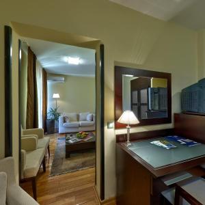 Postel nebo postele na pokoji v ubytování Hotel President garni