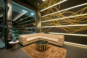 Posezení v ubytování Asiatic Hotel