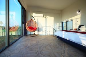 Postel nebo postele na pokoji v ubytování Taroko Yan Hai Bo Villa