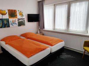 Postel nebo postele na pokoji v ubytování Hotel B&B Seahorse