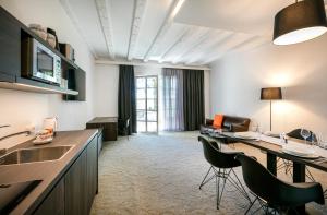 TV a/nebo společenská místnost v ubytování Hotel Spitzerberg by b-smart
