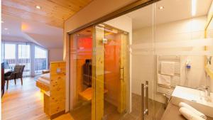 Koupelna v ubytování Hotel Alpina