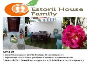Un folleto para una casa con una mesa y una flor rosa en Estoril House Family en Estoril