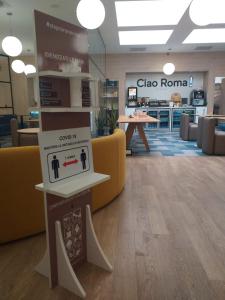 a store with a sign that says clara roma at Air Rooms Rome Airport by HelloSky in Fiumicino
