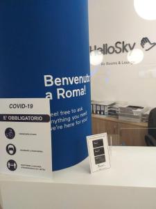 a sign that is on top of a table at Air Rooms Rome Airport by HelloSky in Fiumicino