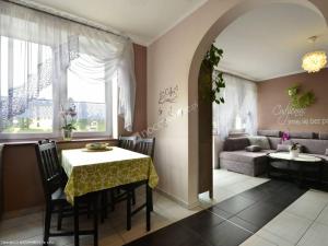 Гостиная зона в Apartamenty Rodzinne