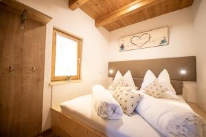 Postel nebo postele na pokoji v ubytování Weingarten & Appartement Auszeit with private Spa