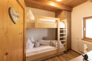Postel nebo postele na pokoji v ubytování Weingarten & Appartement Auszeit with private Spa