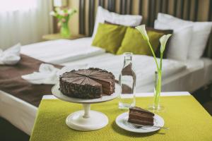 Postel nebo postele na pokoji v ubytování Caramell Premium Resort Superior