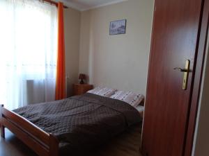 Postel nebo postele na pokoji v ubytování Willa Wiktoria - Chłapowo