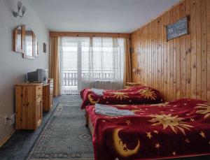 Tempat tidur dalam kamar di Hotel Elitza