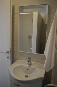 Kúpeľňa v ubytovaní Apartmani Sidro