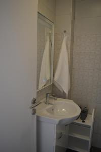 Kúpeľňa v ubytovaní Apartmani Sidro