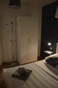 Posteľ alebo postele v izbe v ubytovaní Apartmani Sidro