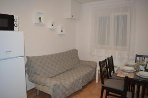 Posedenie v ubytovaní Apartmani Sidro