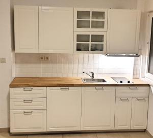 Kuchyň nebo kuchyňský kout v ubytování Apartments Vedran