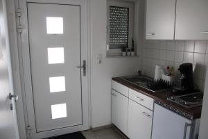 Kuchyň nebo kuchyňský kout v ubytování Ferienwohnung Misita