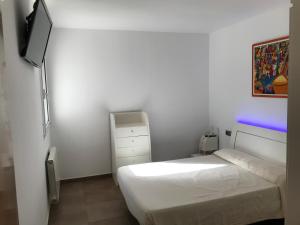 Postel nebo postele na pokoji v ubytování Villa olivella + 37 fotografií