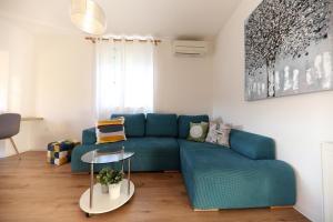 Ein Sitzbereich in der Unterkunft Apartmani Branka Murter