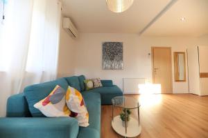 Ein Sitzbereich in der Unterkunft Apartmani Branka Murter