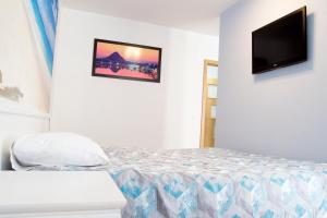 Posteľ alebo postele v izbe v ubytovaní AL-DOM apartamenty Apartament Olymp 308 + 20 fotografií