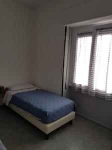 Postel nebo postele na pokoji v ubytování B&B Confine