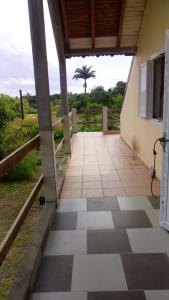 A balcony or terrace at Appartement d'une chambre avec jardin amenage et wifi a Capesterre de Marie Galante a 4 km de la plage