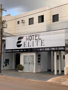 a hotel building with a hotel elite sign on it at Hotel Elite in Rio Verde