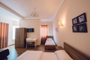 Krevet ili kreveti u jedinici u okviru objekta Hotel Loredano