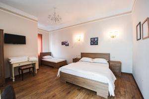 Krevet ili kreveti u jedinici u okviru objekta Hotel Loredano