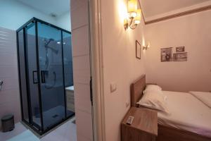 Krevet ili kreveti u jedinici u okviru objekta Hotel Loredano