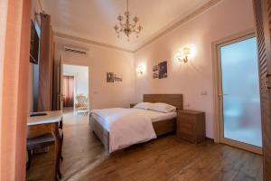 Katil atau katil-katil dalam bilik di Hotel Loredano