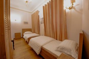 Krevet ili kreveti u jedinici u okviru objekta Hotel Loredano