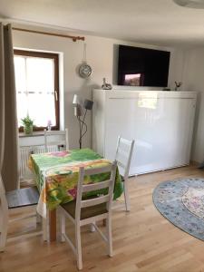a dining room with a table and two chairs at BohnApart52 in Zwiesel