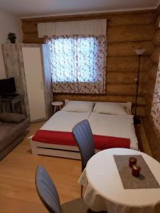 Postel nebo postele na pokoji v ubytování U Srubu Sychrov