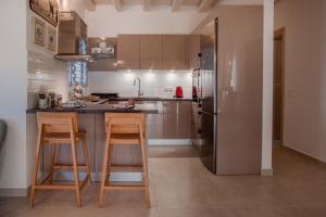 Kuchyň nebo kuchyňský kout v ubytování Eleni's Guesthouse