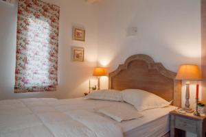 Postel nebo postele na pokoji v ubytování Eleni's Guesthouse