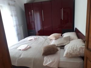 Posteľ alebo postele v izbe v ubytovaní Apartman Nika