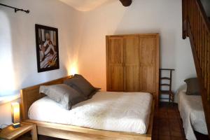 Ένα ή περισσότερα κρεβάτια σε δωμάτιο στο Auberge d'Anais