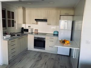 Kuchyňa alebo kuchynka v ubytovaní Apartamento in Cullera. Spain