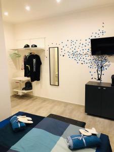 TV a/nebo společenská místnost v ubytování Dal Barce Rooms + 26 fotografií