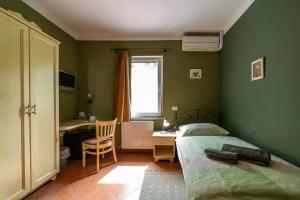 Postel nebo postele na pokoji v ubytování Rooms Herman