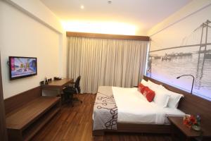 A television and/or entertainment centre at Vivanta Kolkata EM Bypass