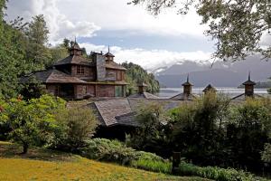 a scenic view of a small village with trees at Puyuhuapi Lodge & Spa in Puerto Puyuhuapi