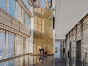 a view from the top of a building with a boat on the floor at Park Hyatt Beijing in Beijing