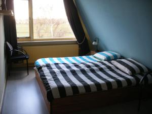 Postel nebo postele na pokoji v ubytování B&B-Edam