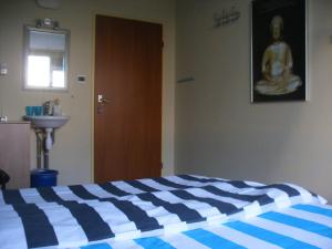 Postel nebo postele na pokoji v ubytování B&B-Edam