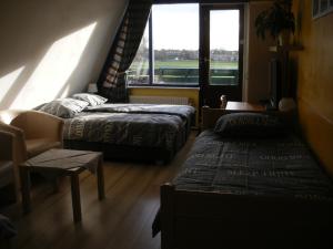Postel nebo postele na pokoji v ubytování B&B-Edam