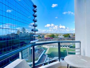 a balcony with a view of a city at Milson Serviced Apartments in Sydney