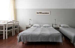 Postel nebo postele na pokoji v ubytování Promenaadi Villa